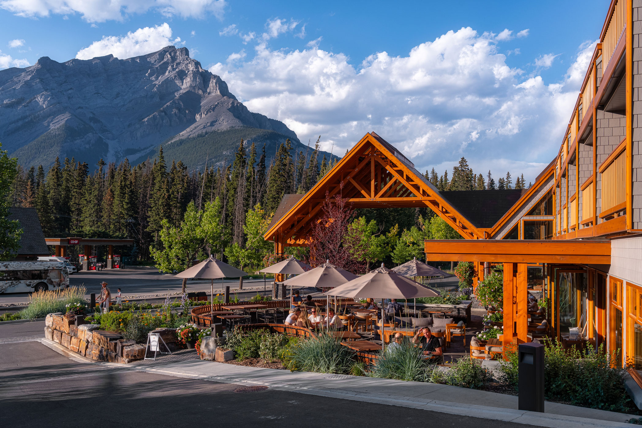 Side profile view of the Sudden Sally Patio at the Hotel Canoe with Cascade Mountain in the background